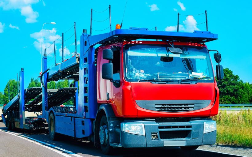 Cars carrier truck in road or highway.